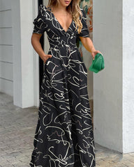 Deep V-neck printed wide-leg jumpsuit - Black