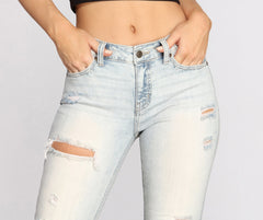 Josie Mid Rise Destructed Jeans - Lady Occasions