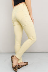 YMI Jeanswear Kate Hyper-Stretch Full Size Mid-Rise Skinny Jeans in Banana Cream